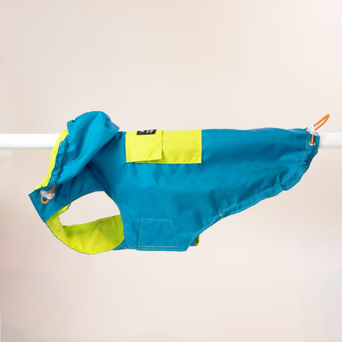 Raincoat for dogs in petrol und lime