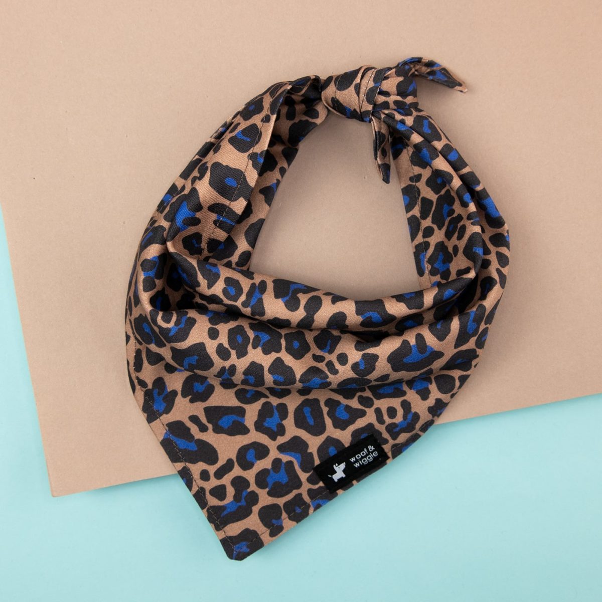 Brown dog bandana with a blue leopard print